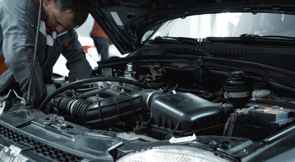 A mechanic performing a car servicing in Toowoomba.