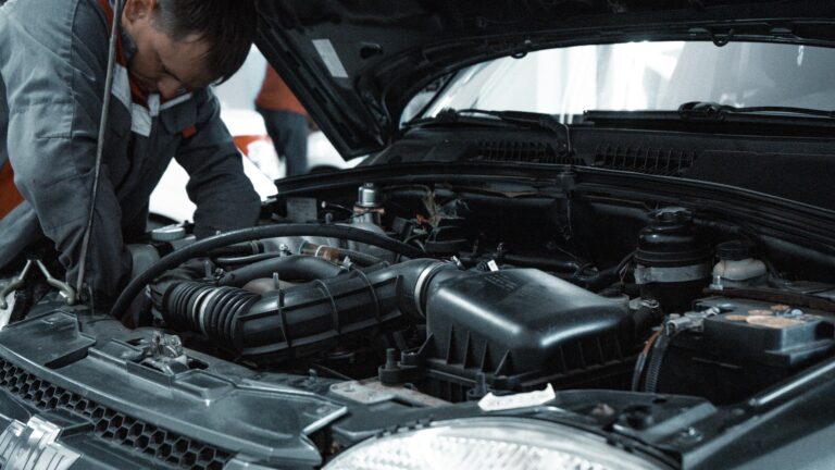 A mechanic performing a car servicing in Toowoomba.